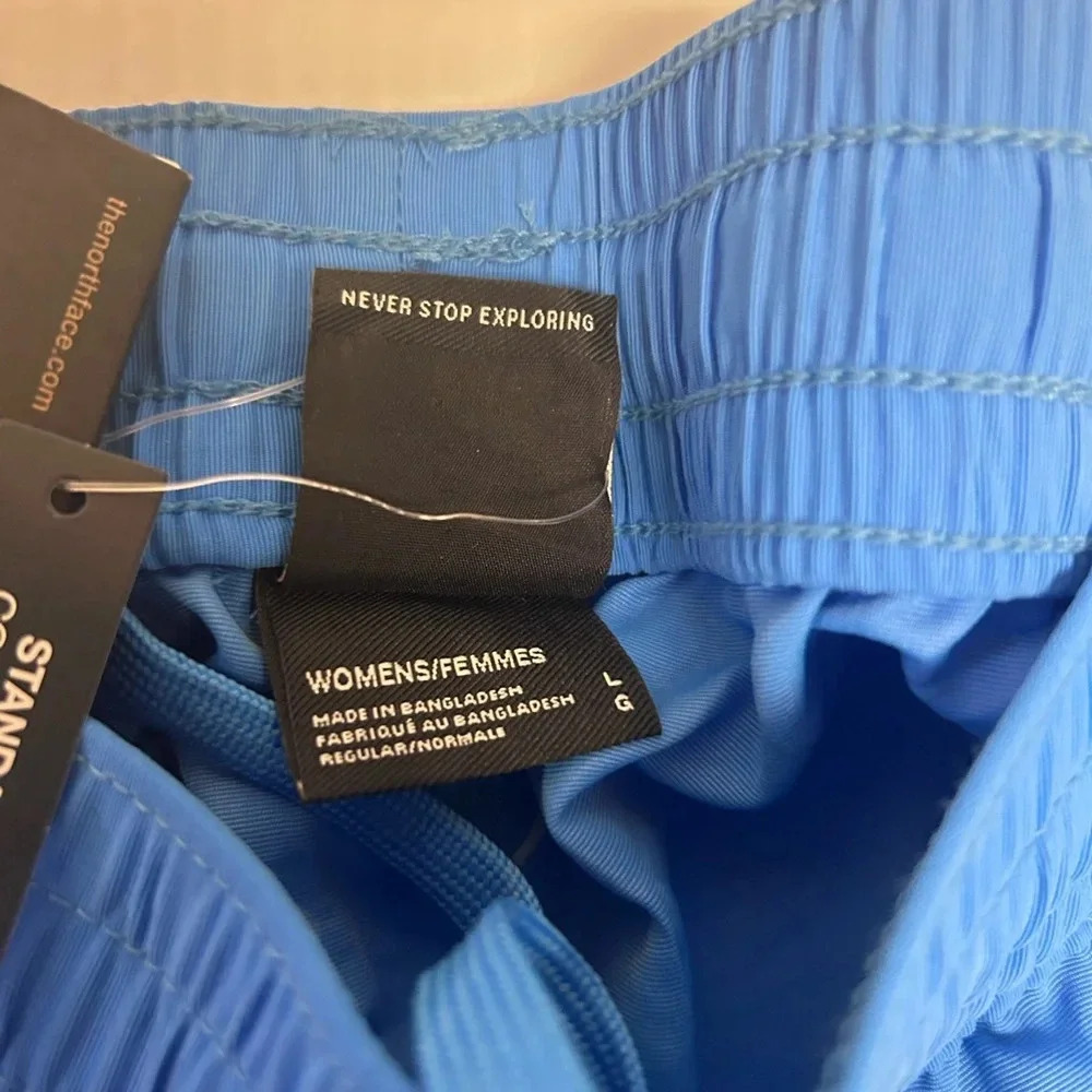 💦”North Face” NWT Women’s Blue Nylon Easy Wind Pant Flashdry w/ Pockets Size L💙 - Picture 9 of 16